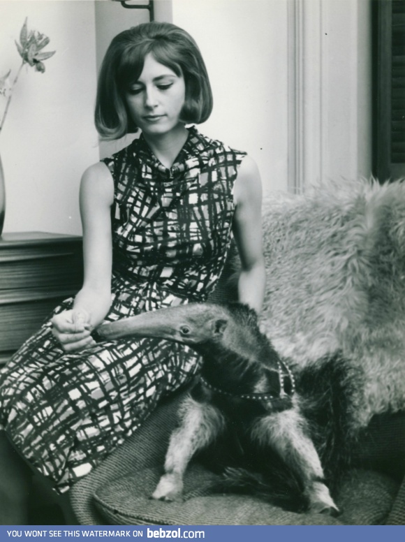 Just my mom with her pet anteater, Claude.  