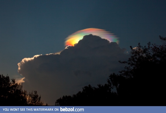 An extremely rare rainbow-colored pileus iridescent cloud over Ethiopia