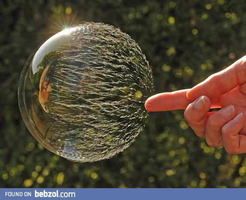 Just a bubble popping in mid-air.