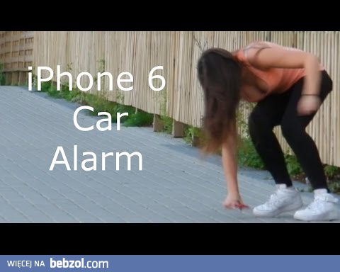 iPhone 6 z zamontowanym alarmem samochodowym